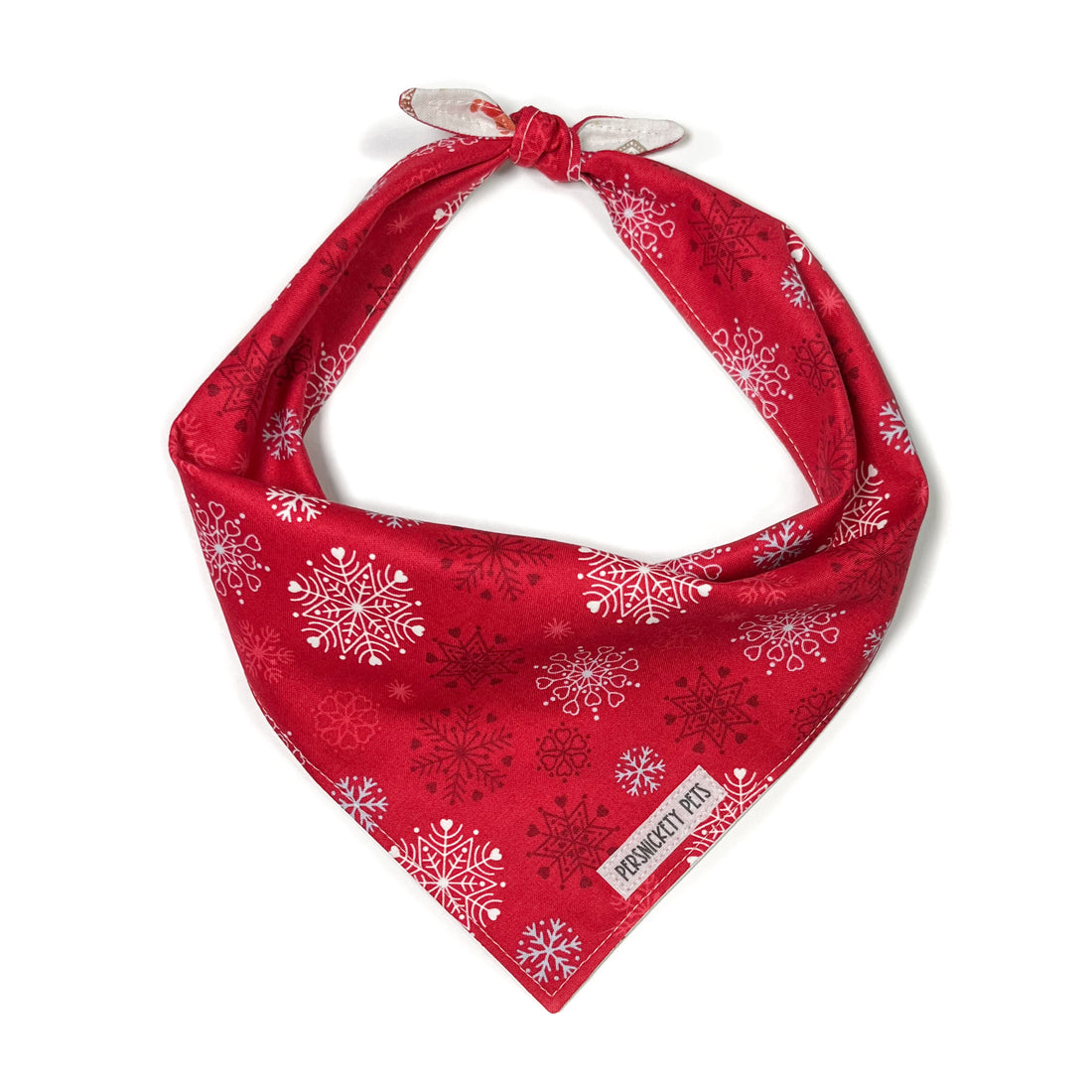 Snowflakes and holiday cookies reversible bandana tied